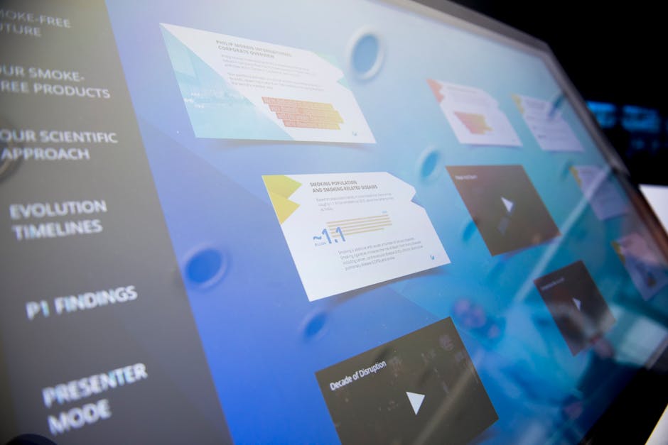 A presentation slide with charts on a screen