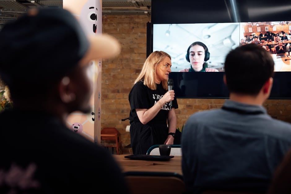 A video conference call with multiple named participants on screen
