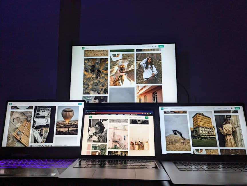 Two laptops showing different documents on screen